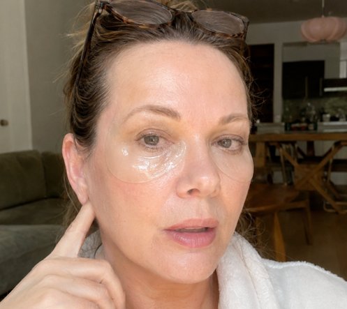 Liz Steinhart applying under-eye treatment